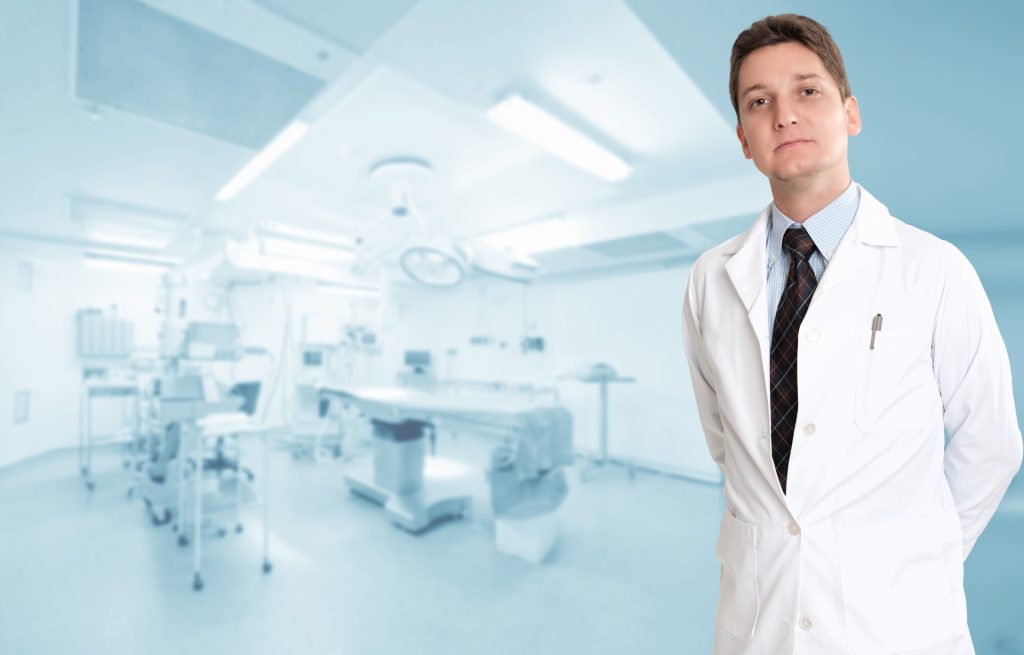 Doctor posing for a pic in a medical facility